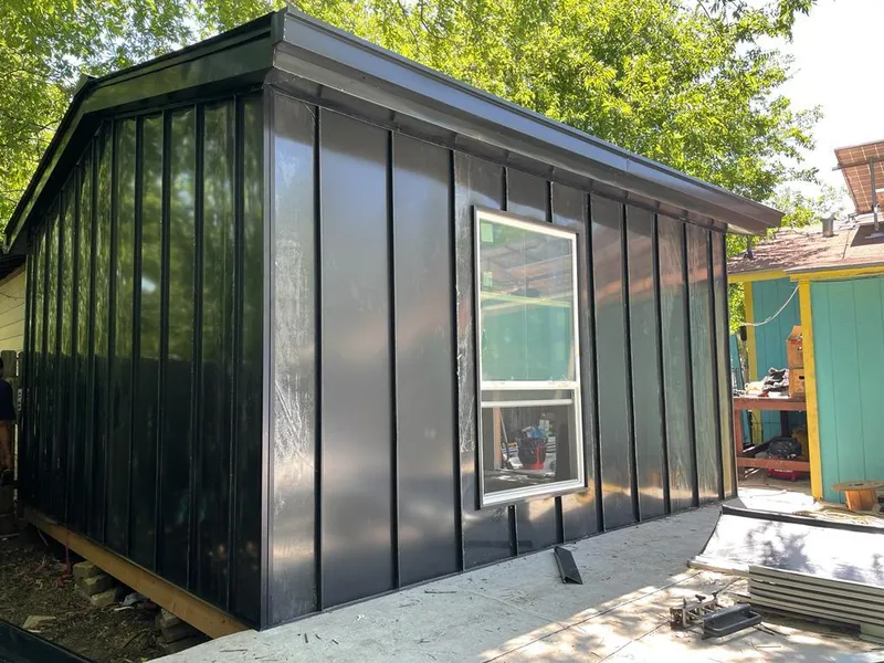 Black standing seam metal wall panels for Metal Roof Installation in Addis